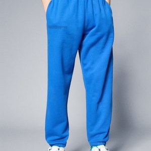 KIDS MIDWEIGHT TRACK PANTS UNISEX - Tracksuit bottoms - blue